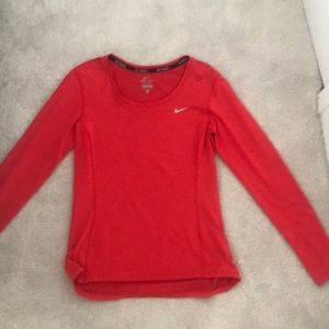 Reddish orange Nike pullover